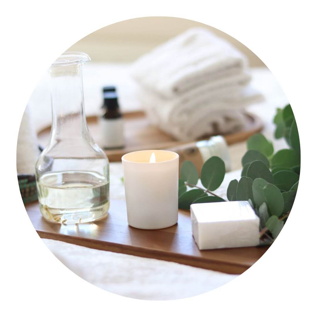 Bathing woman using bath fizz powder to create a relaxing bath time