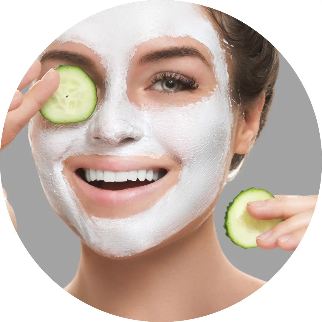 Buddha Beauty Skincare vegan and cruelty free  face mask and face scrub, woman applying mask 